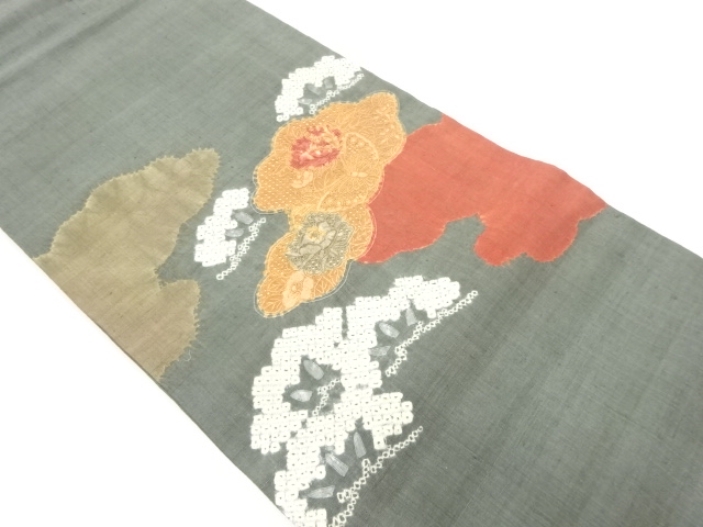 手織り紬汕頭刺繍絞り雲に花々・蝶模様名古屋帯：リサイクル